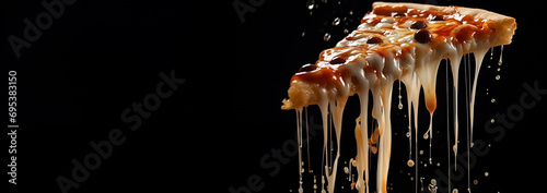 Pizza slice with melted cheese dripping. Large Pepperoni and Mozzarella Pizza on black table, top view, copy space. Delicious fresh baked pizza.