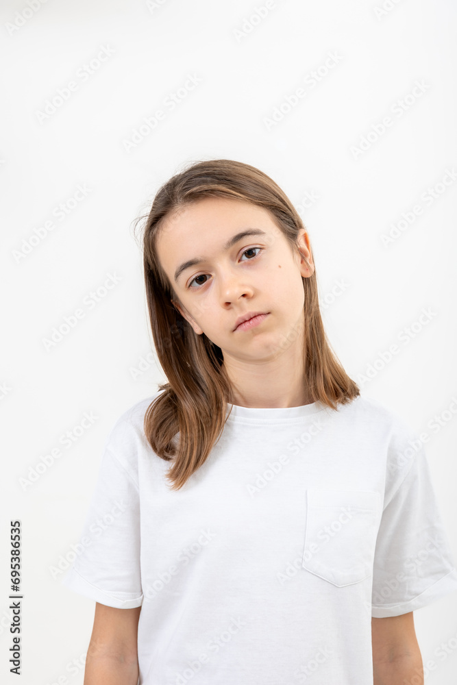 Tired teenage girl isolated on white background. Tired teenage girl isolated on white background.