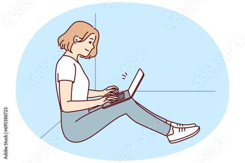 Positive woman freelancer sitting on floor near wall with laptop on lap. girl works remotely in comfortable environment performing instructions of manager via Internet. Flat vector illustration