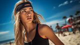 A beautiful young woman standing on the beach, wearing a black sports headband and a black T-shirt