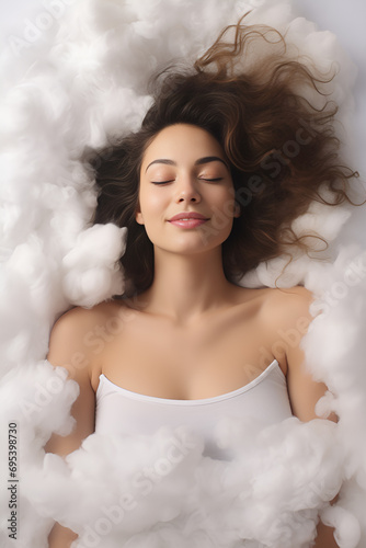 young beautiful woman lying on the cloud