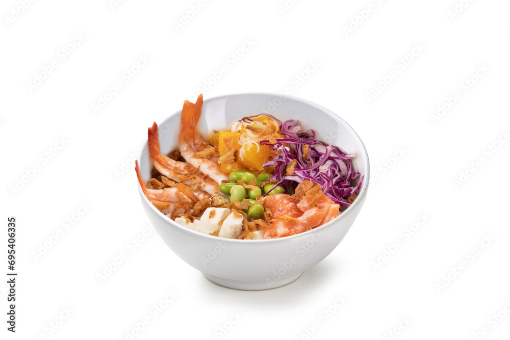 Poke bowl with shrimp, crispy onion, edamame, salmon, cabbage, feta, pineapple isolated on white background