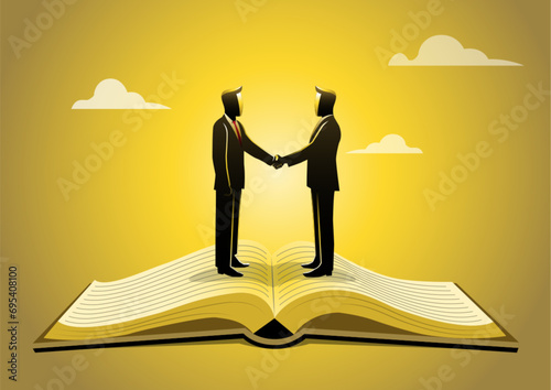 An open book with two businessmen shaking hands above it
