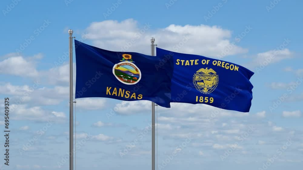 Oregon and Kansas US state flags waving together on cloudy sky, endless seamless loop Oregon and Kansas US state flags waving together on cloudy sky, endless seamless loop