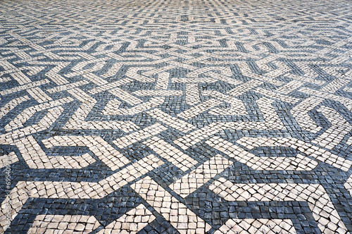 Geometric Pattern in Traditional Mosaic Paving Tiles in Lisbon  Portugal.