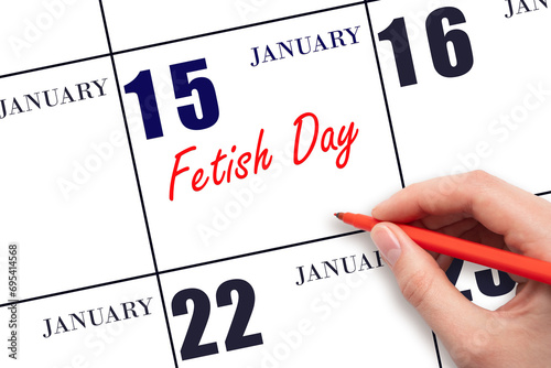 January 15. Hand writing text Fetish Day on calendar date. Save the date.