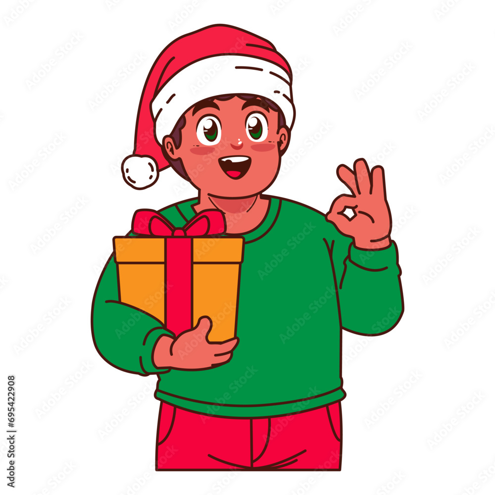 A Boy in a Santa hat holding a Christmas gift A Boy in a Santa hat holding a Christmas gift