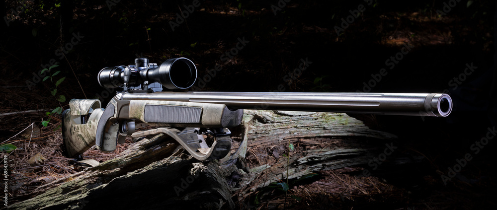 Break action muzzleloader rifle