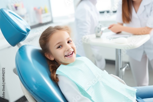 Child Receiving Dental Treatment At The Dentists Office