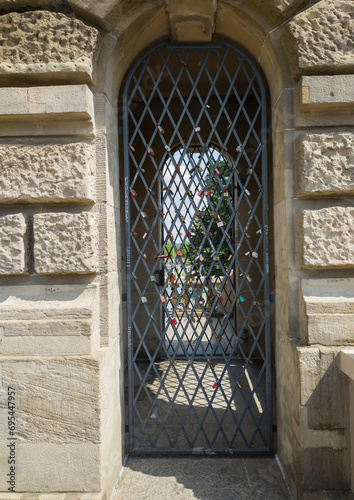 The entrance door to the tower is in the form of a grid.