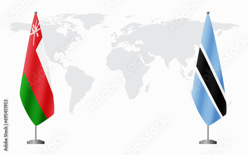 Oman and Botswana flags for official meeting
