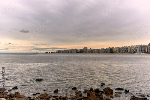Landscape view of the city of Montevideo in the area of Pocitos. Tourist place in Uruguay, sunset on a cloudy day.
