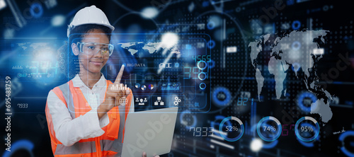 Future building construction engineering and technology project concept. Double exposure African American engineer using digital laptop and smart industry and IOT software to control operation.