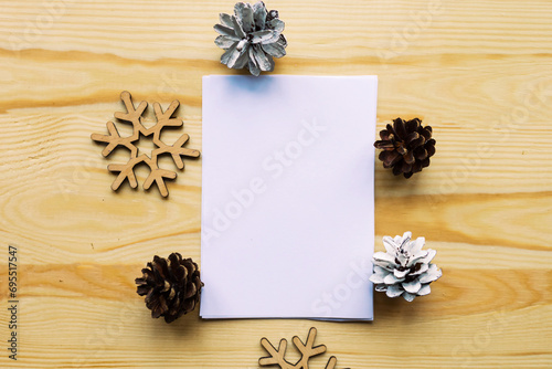 mockup blank and christmas decoration on wooden background © eugen
