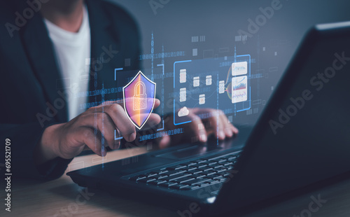 User shows security protection icon with virtual screen on notebook computer, concept of cyber security, database hacking, internet cybercrime, firewall security, hacker attacks, data theft