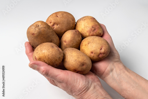 Raw potatoes isolated on a white background. A popular vegetable. An essential product for cooking