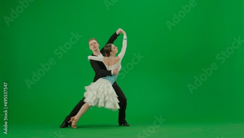 Elegant Ballroom Dance Couple in Action chroma key. © kinomaster