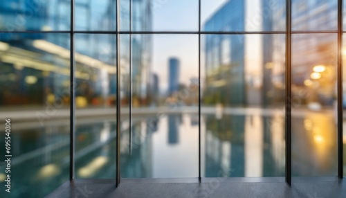 blurred abstract glass wall from building in city town