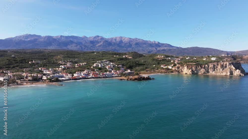 Crete, Greece. Aerial drone shot. Falassarna Beach in Chania, Elafonisi lagoon, Falassarna, Hills and town of Palaiokastro, Old christian church ruins in Crete, Katholiko Monastery greek landmark Crete, Greece. Aerial drone shot. Falassarna Beach in Chania, Elafonisi lagoon, Falassarna, Hills and town of Palaiokastro, Old christian church ruins in Crete, Katholiko Monastery greek landmark