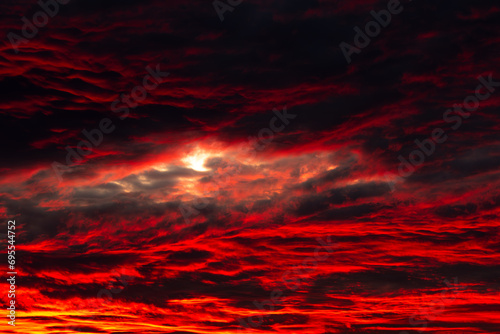 crazy sunset in the sky with red like colors
