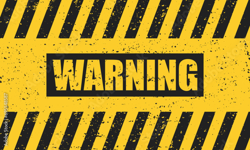 Abstract grunge black warning sign on a yellow background.