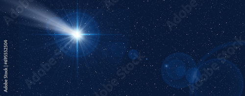 Christmas star and starry sky. Nativity of Jesus Christ. Background of the beautiful night blue starry sky and bright star. photo