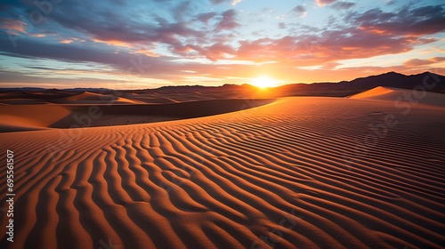 Sunset over the sand dunes in Death Valley National Park  California