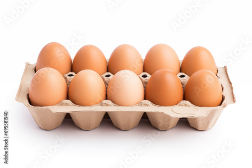 10 Eggs in carton box isolated on white background. Close up