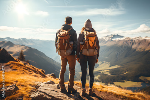 back, rear view of mature Couple. backpacker man and woman hikers on top of mountain, together enjoying climbing. friends with rucksacks looking each other with smiley face warm clothes Generative AI