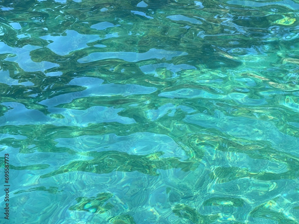 Fototapeta premium Beautiful clear sea water blue turquoise transparent surface 