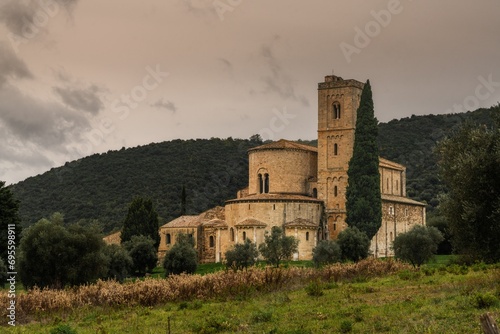 Картината върху платно view of the Abbey of Sant'Antimo near Castelnuovo dell'Abate in Tuscany
