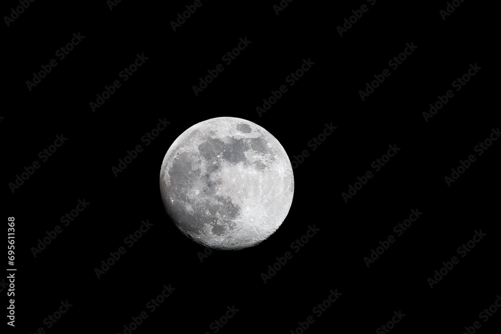 Moon in the sky with a black background Moon in the sky with a black background