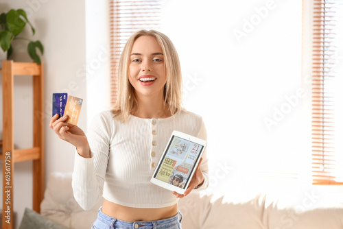 Young woman with tablet and...