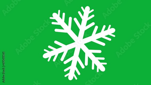 Isolated snowflake rotating on isolated green screen. Christmas and New Year Background. Winter Background with motion snowflake gif design for creative designs Merry Christmas and Happy New Year.