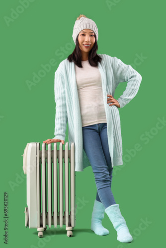 Young asian woman in winter...