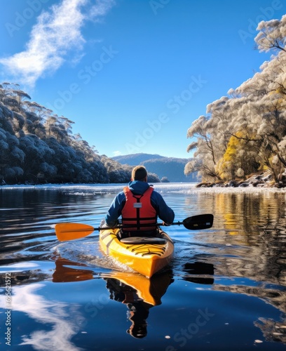 kayaker paddles down loch ness in snow and ice