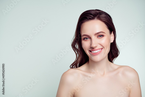 Photo portrait of lovely young lady toothy beaming smile spa salon isolated on light gray color background