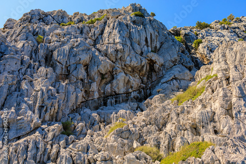 Beautiful relief rocks. Background with selective focus and copy space photo