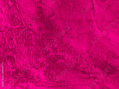 magenta painted canvas closeup with rough texture