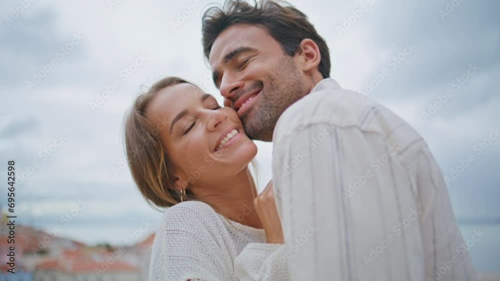 Love couple touching faces at seascape date closeup. Loving sexy pair enjoying Love couple touching faces at seascape date closeup. Loving sexy pair enjoying