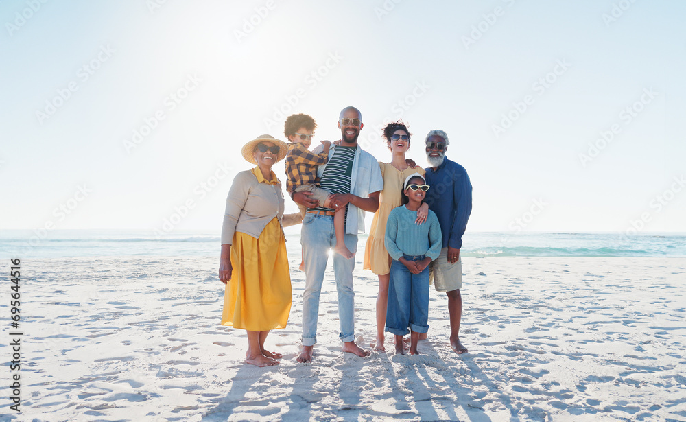 Portrait, beach and family with vacation, love and smile with weekend break, getaway trip and sunshine. Summer, grandparents and mother with father, children and seaside with kids, holiday and water