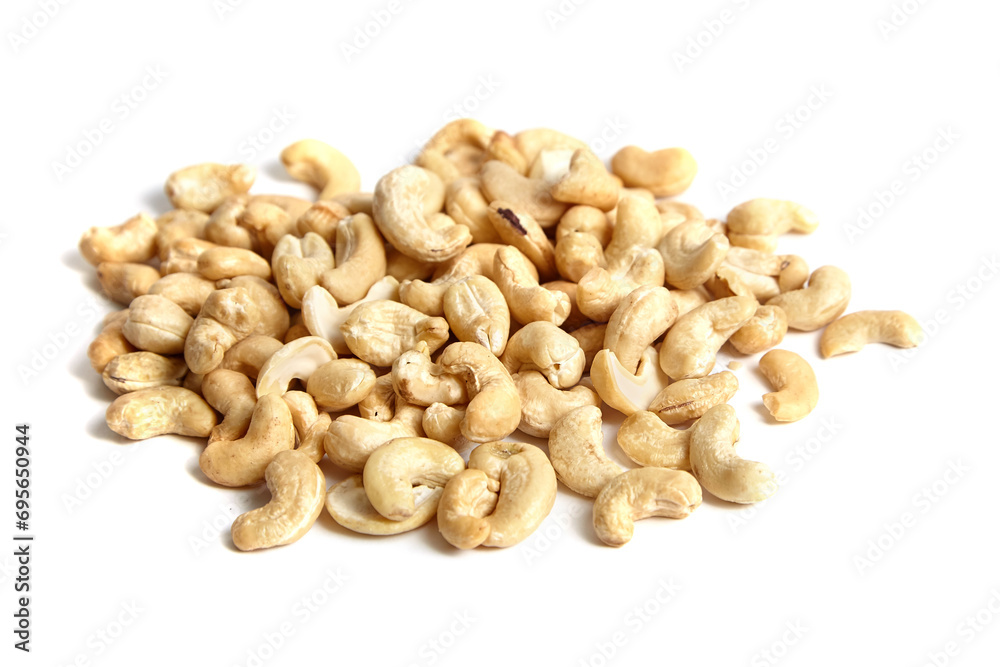 Cashew nut heap isolated on white background. Abundant cashew nuts, a delicious bunch Cashew nut heap isolated on white background. Abundant cashew nuts, a delicious bunch