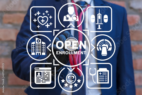 Doctor using virtual touch screen sees inscription: OPEN ENROLLMENT. Open Enrollment Medical concept. Open Enrollment 2024. photo
