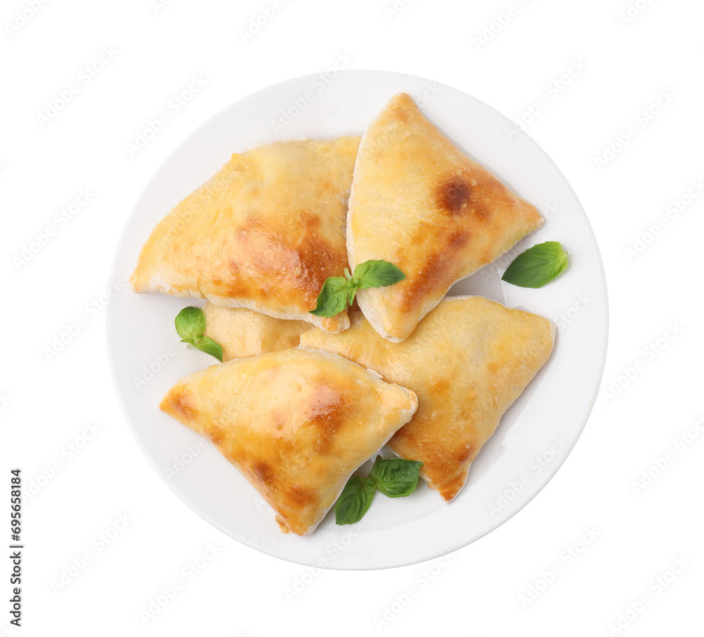 Delicious samosas and basil isolated on white, top view