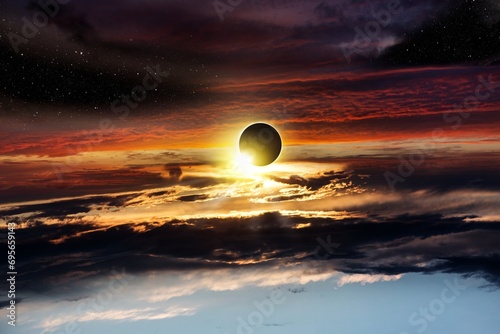 Obraz na płótnie total solar eclipse in clouds, atmosphere . eclipse of the sun w salonie