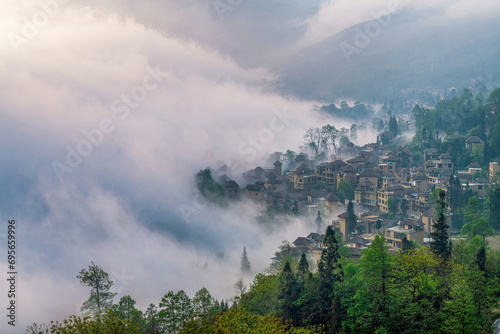 The cottage in the morning fog of Ailao Mountain  Yuanyang County  Honghe Prefecture  Yunnan Province  China.