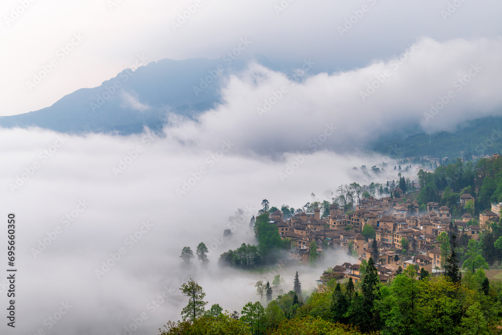 Fototapeta premium The cottage in the morning fog of Ailao Mountain, Yuanyang County, Honghe Prefecture, Yunnan Province, China.