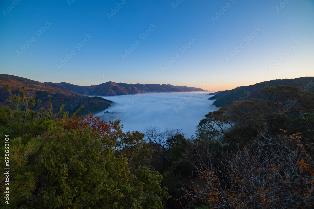 A sea of clouds at the top of the mountain in Kyoto wide shot
