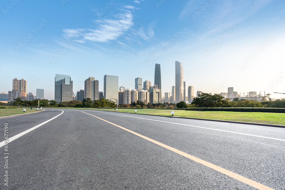 city skyline with road