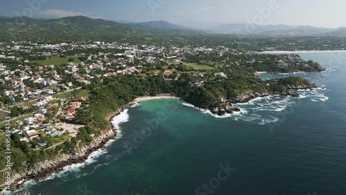 Aerial hing angle of Puerto Escondido Oaxaca coastline travel holiday surf destination in Mexico photo
